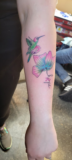 Explore lisa frank tattoo ideas, creative tattoo ideas in Akron, available at Absolute Tattoo Company