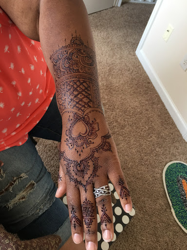 Explore small fish tattoo ideas, creative tattoo ideas in Concord, available at Naseera Fazil Henna Art