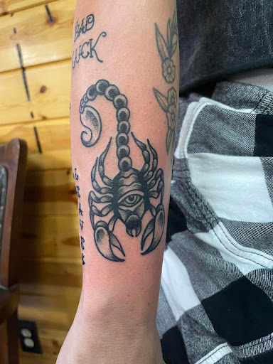 Explore semicolon tattoo ideas for females, creative tattoo ideas in Foley, available at Symbolic Ink Tattoo Studio