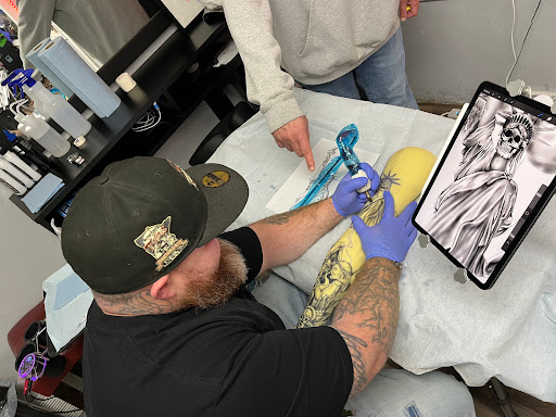 Explore letter t tattoo ideas, creative tattoo ideas in Saint Paul, available at No Joke Tattoo Studios