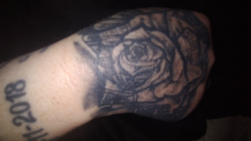 Explore female neck tattoo ideas, creative tattoo ideas in Seymour, available at American Gypsy Tattoo Corp.