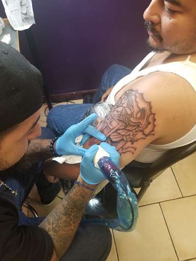 Explore street signs tattoo ideas, creative tattoo ideas in Pleasantville, available at Burn N Ink Studios