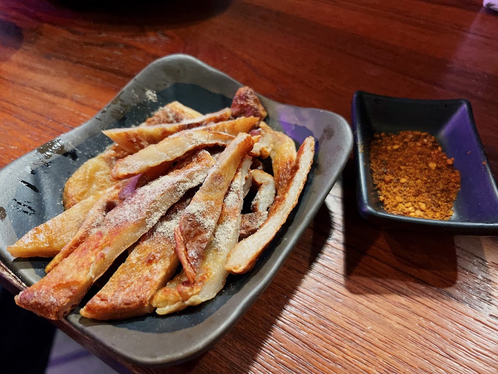 賣烤魚的。 的照片