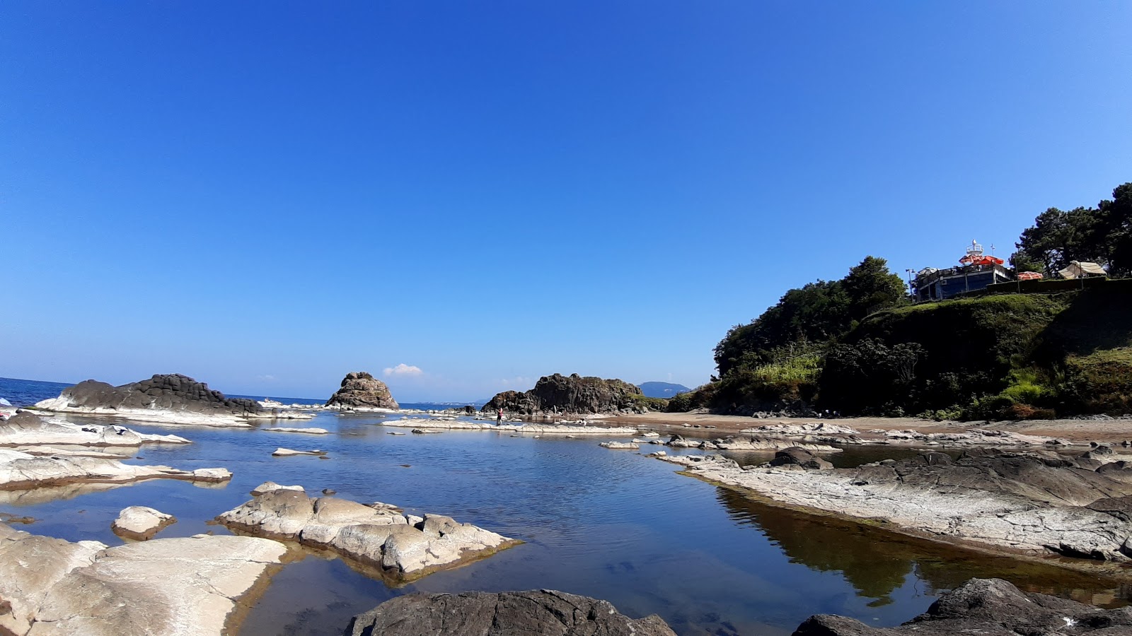 Foto di Unye Feneralti Plaji con una superficie del acqua cristallina