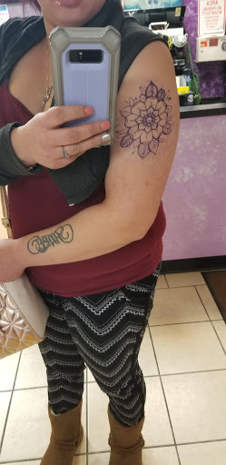 Find middle boob tattoo ideas for your next unique tattoo in Cleveland at Tattoo Cafe