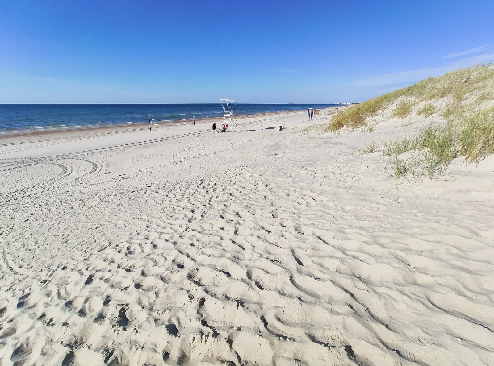 Zdjęcie Smiltyne Beach z powierzchnią drobny beżowy piasek