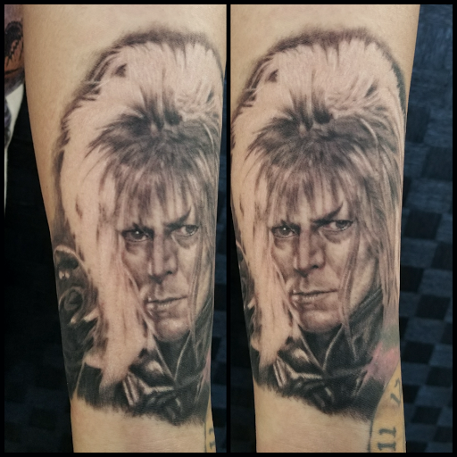 Explore elephant tattoo ideas for females, creative tattoo ideas in Green Bay, available at The Blue Gem Tattooing