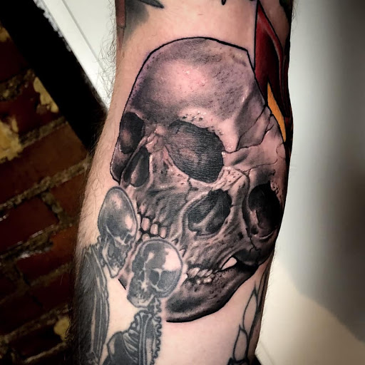 Explore tattoo ideas of strength, creative tattoo ideas in Jeffersonville, available at Spring St. Tattoo