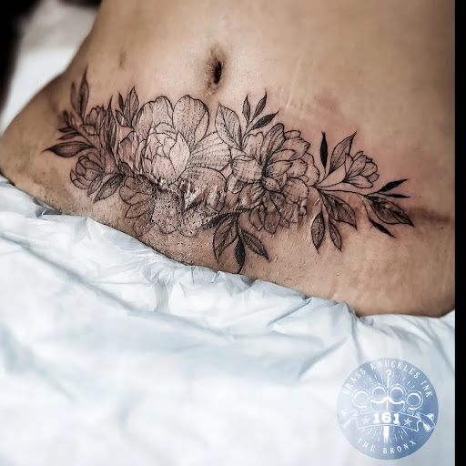 Explore female full back tattoo ideas, creative tattoo ideas in Bronx, available at Brass Knuckles Ink Tattoo Studio