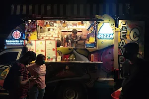 heavenly crust - wood fired pizzas on truck image