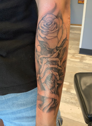 Explore archer tattoo ideas, creative tattoo ideas in Des Moines, available at Skin Kitchen Tattoo