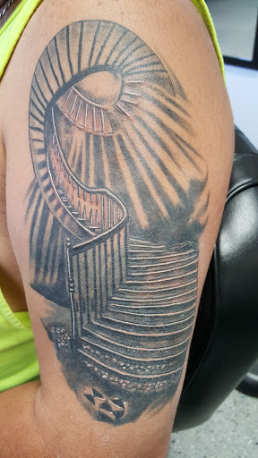 Explore forearm christian tattoo ideas, creative tattoo ideas in Wichita, available at Body Canvas Tattooing