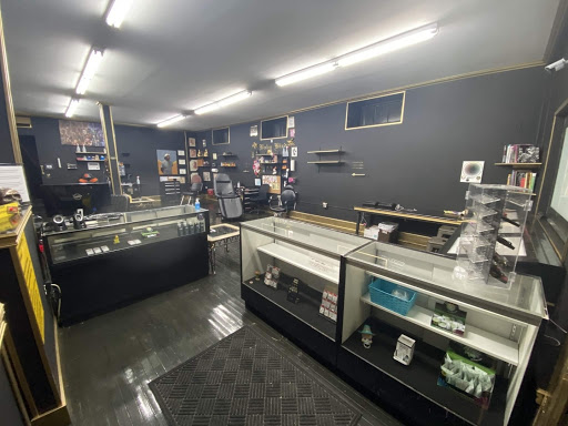 Explore bikini tattoo ideas, creative tattoo ideas in Springfield, available at Golden Peso Tattoo and Piercing Shop