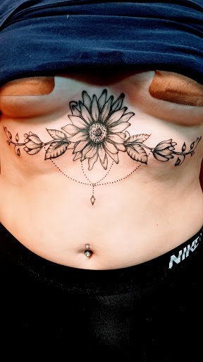 Explore cyberpunk edgerunners tattoo ideas, creative tattoo ideas in Salem, available at Body Graphix Tattoo Studio