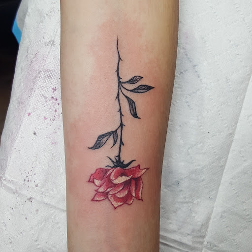 Explore mother and father tattoo ideas, creative tattoo ideas in Billings, available at Sovereign Tattoo