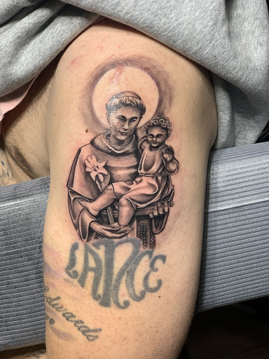 Explore female tattoo ideas for lower back, creative tattoo ideas in Youngstown, available at Twisted Metal Custom Body Art