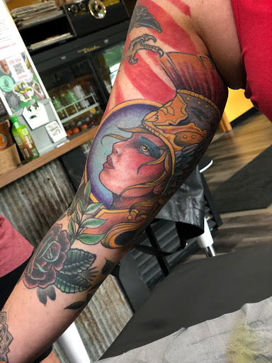 Explore wrist cross tattoo ideas, creative tattoo ideas in Duluth, available at Gitchee Gumee Tattoo