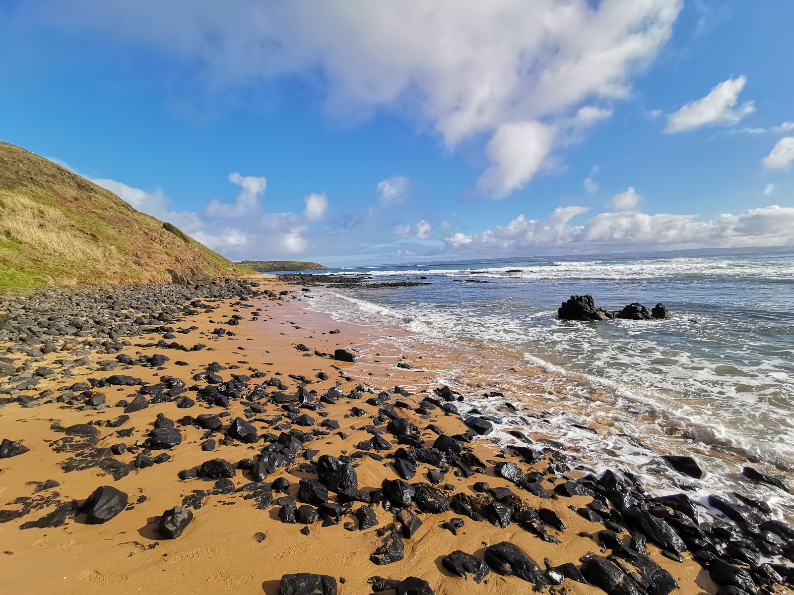Photo de Flynns Beach - endroit populaire parmi les connaisseurs de la détente