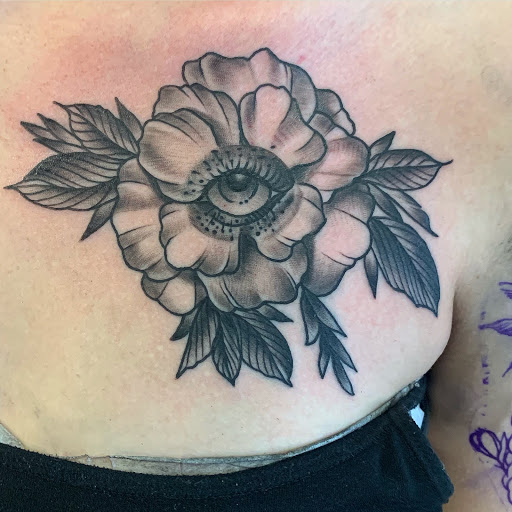 Explore small alien tattoo ideas, creative tattoo ideas in Rapid City, available at Pinup Parlor Tattoo Studio