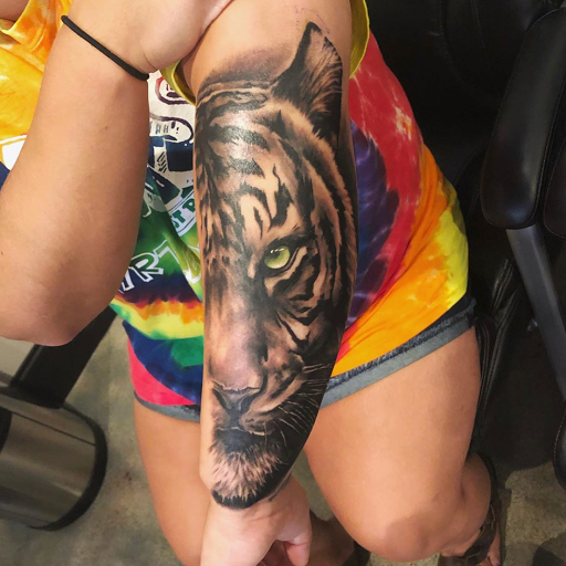 Explore flower tattoo ideas for females, creative tattoo ideas in Myrtle Beach, available at Elite Ink Tattoos of Myrtle Beach