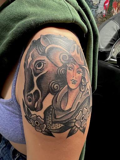 Explore dragon tattoo ideas for women, creative tattoo ideas in Burlington, available at Afterlife Tattoo Company