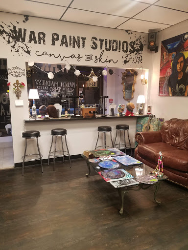 Explore tattoo cover ideas, creative tattoo ideas in Painesville, available at War Paint Studios - Canvas and Skin