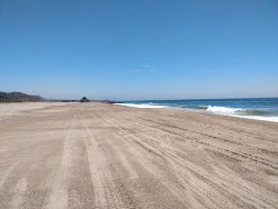 Fotografie cu Tecuan beach cu drept și lung