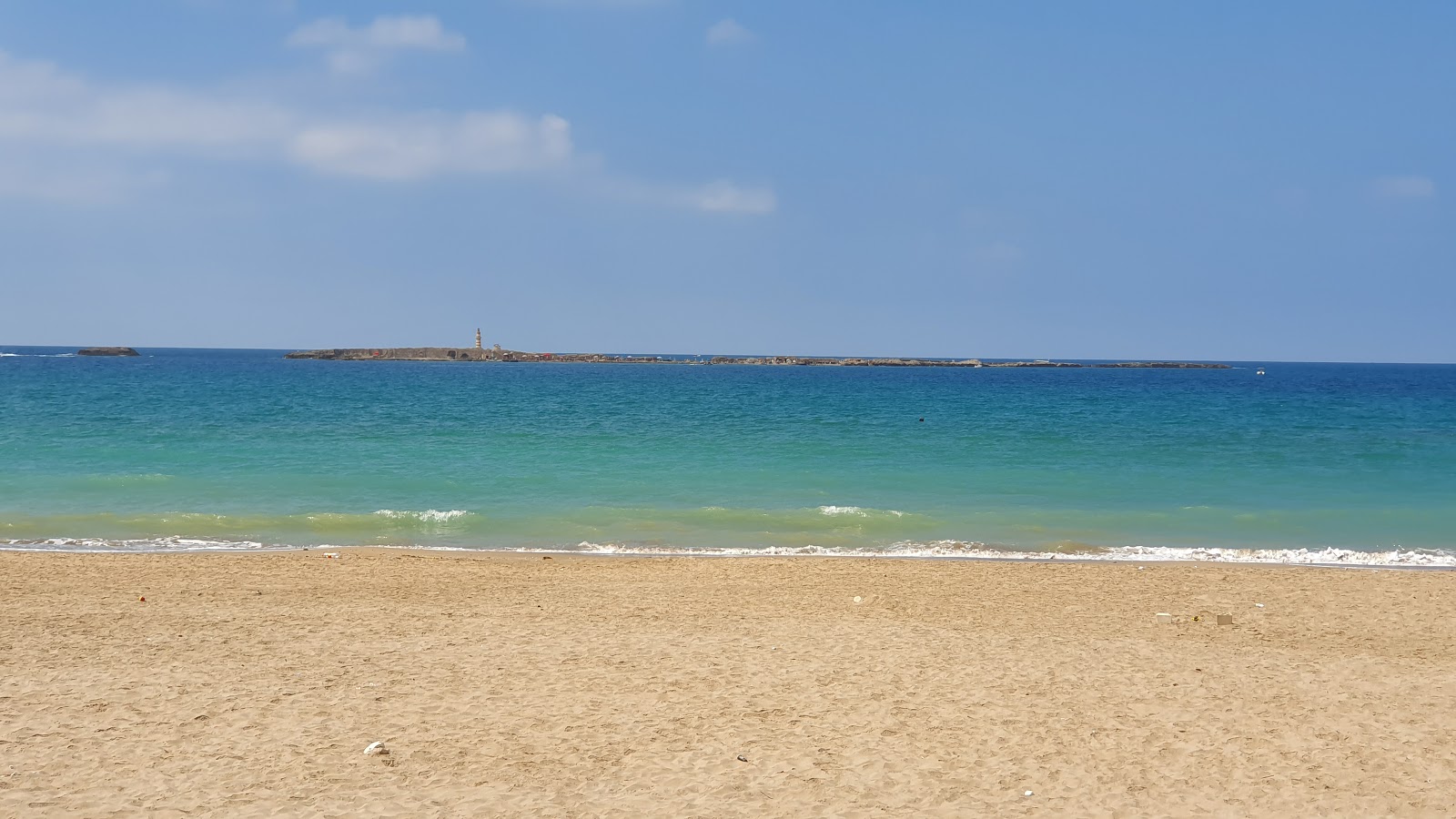 Foto van Saida Beach met ruim strand