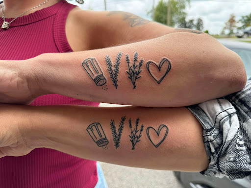 Explore tattoo ideas for father of daughter, creative tattoo ideas in Athens, available at United Ink Tattoos and Body Piercings