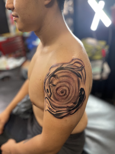 Explore back arm tattoo ideas for guys, creative tattoo ideas in Goose Creek, available at Red Kirin Tattoo