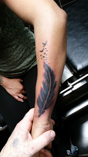 Explore female chest piece tattoo ideas, creative tattoo ideas in Erie, available at EliKingInk