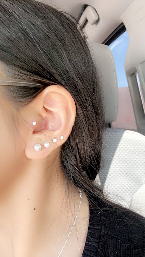 Find tummy tuck scar tattoo ideas for your next unique tattoo in Great Falls at Three Moons Body Shop