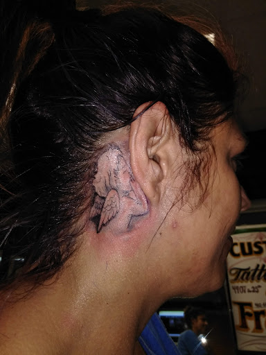 Explore vacation tattoo ideas, creative tattoo ideas in Omaha, available at A New Creation Tattoo