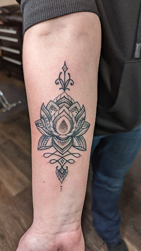 Explore art nouveau tattoo ideas, creative tattoo ideas in Rochester, available at Axe of Kindness Tattoo