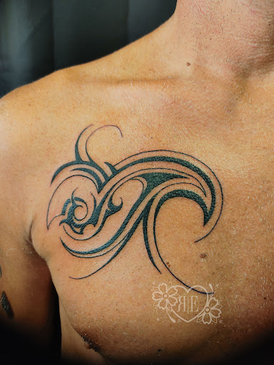 Explore red string of fate tattoo ideas, creative tattoo ideas in Brick, available at Radiant Energy Tattoo