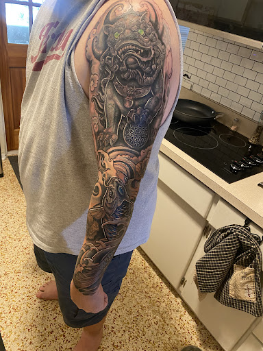 Explore outlaw tattoo ideas, creative tattoo ideas in Sarasota, available at SEVEN SINS Tattoo Studio