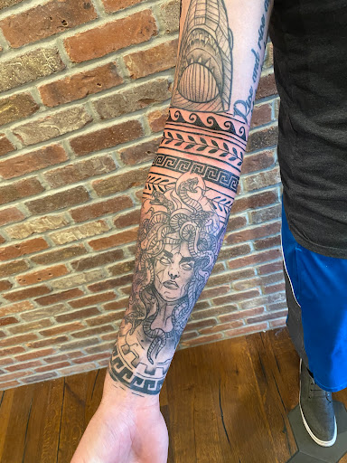 Explore male stomach tattoo ideas, creative tattoo ideas in Sauk City, available at The Madison Tattoo Company