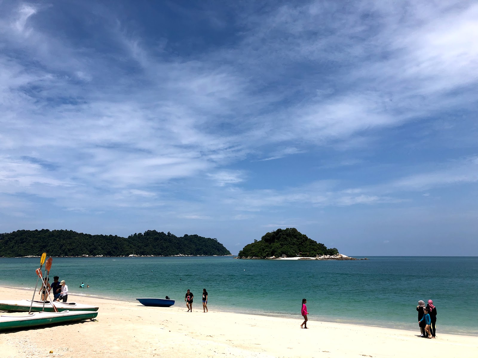 Photo of Teluk Nipah Coral Beach surrounded by mountains