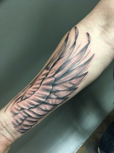 Explore shoulder tattoo ideas men, creative tattoo ideas in Sauk City, available at The Madison Tattoo Company
