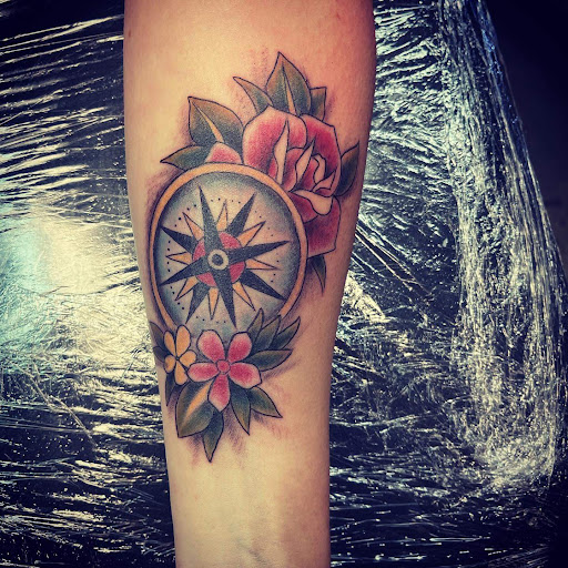 Explore rose idea tattoos, creative tattoo ideas in Cocoa Beach, available at The Corner Tattoo and Piercing Studio