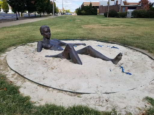 Untitled Bronze (Female Nude Reclining in Sand) sculpture