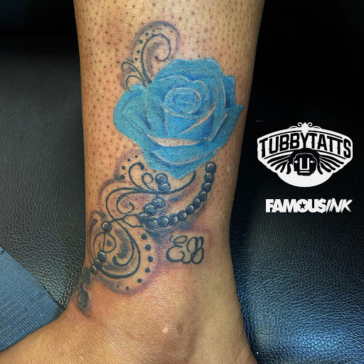 Explore teaching tattoo ideas, creative tattoo ideas in Hammond, available at Famous Ink, Inc.