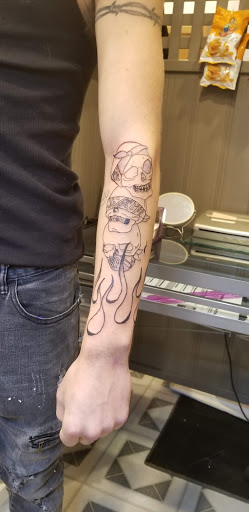 Explore bass guitar tattoo ideas, creative tattoo ideas in Davis, available at SIX GUN SOUND TATTOO