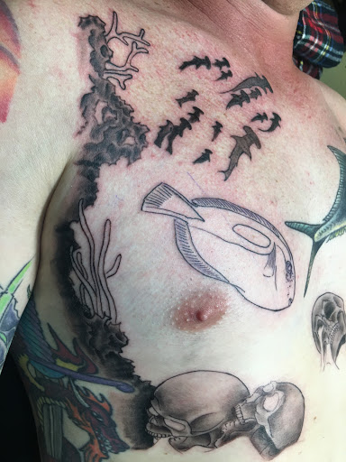Explore tree sleeve tattoo ideas, creative tattoo ideas in Okeechobee, available at Muck City Tattoos & Piercings