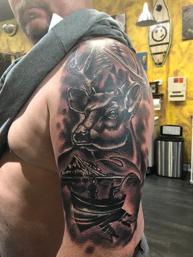 Tattoo Shop «Scratch The Surface Tattoo», reviews and photos, 6550 International Dr #111, Orlando, FL 32819, USA