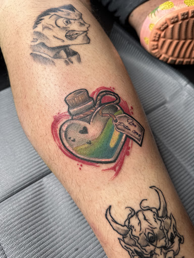 Explore floral tattoo ideas for females, creative tattoo ideas in Apple Valley, available at 21st Vintage Tattoo