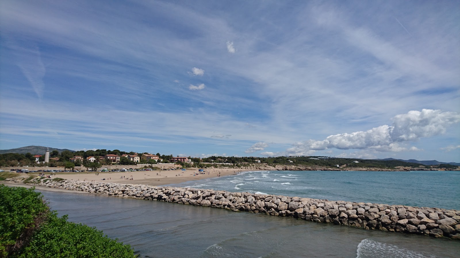 Foto af Far de Sant Cristofol med lille bugt