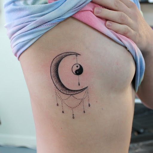 Explore cool face tattoos ideas, creative tattoo ideas in Fort Myers, available at Tiger Lotus Tattoo and Piercing