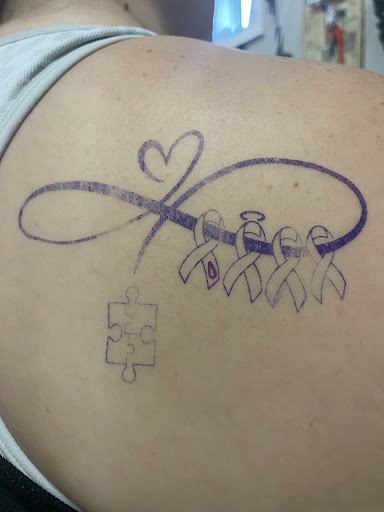 Explore scarlet witch tattoo ideas, creative tattoo ideas in Auburndale, available at Till Death Tattoo Studio