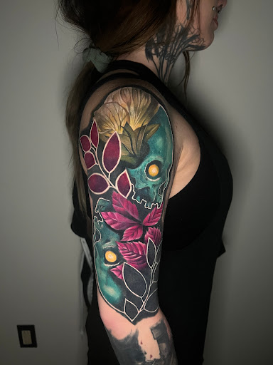 Explore unique knee tattoo ideas, creative tattoo ideas in Lakeville, available at SharkTooth Tattoo & Gallery